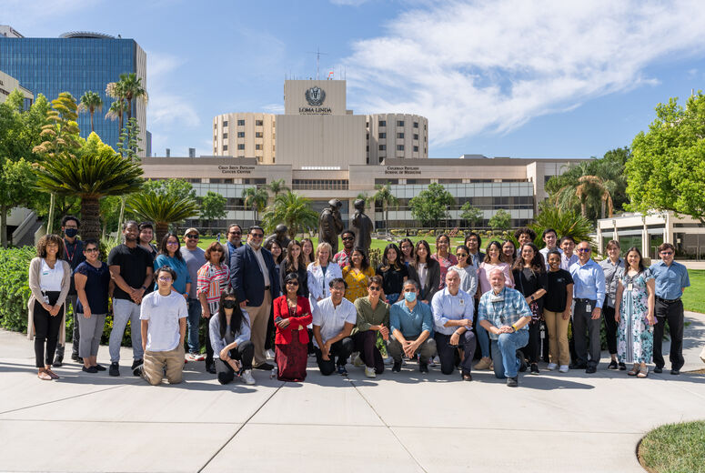 Tamara Thomas, MD, dean of the School of Medicine, with research students