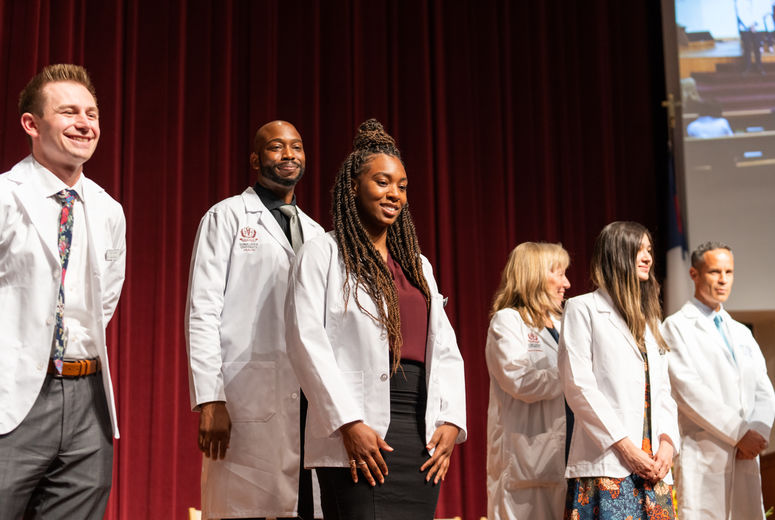The white coats that symbolize the beginning of their journey as future physicians.