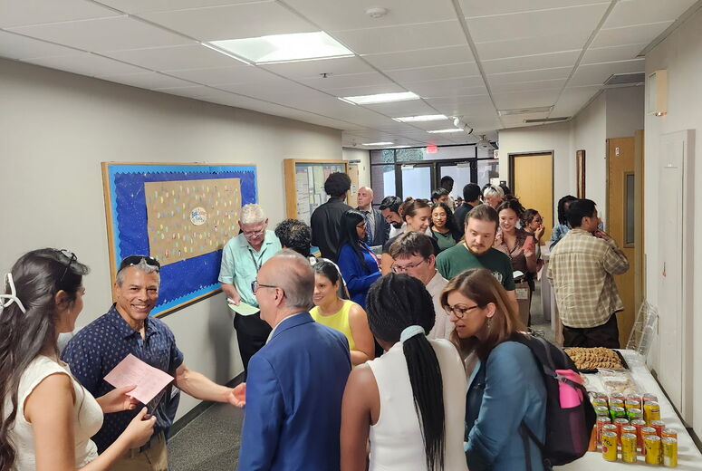 group of students and faculty at Basic Sciences new student mixer