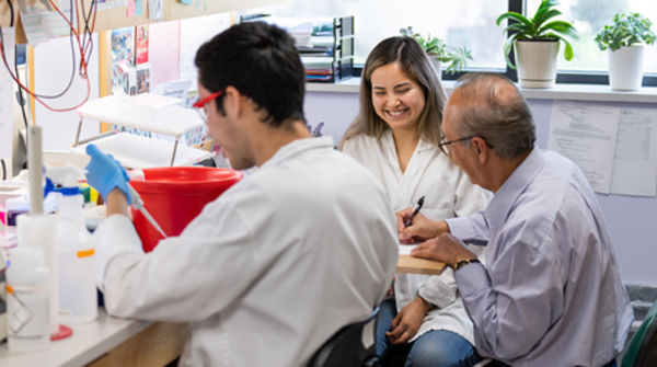 researchers smiling working on data