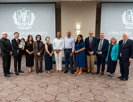 Photo of group of faculty physicians and alumni for 2026 AOA Banquet